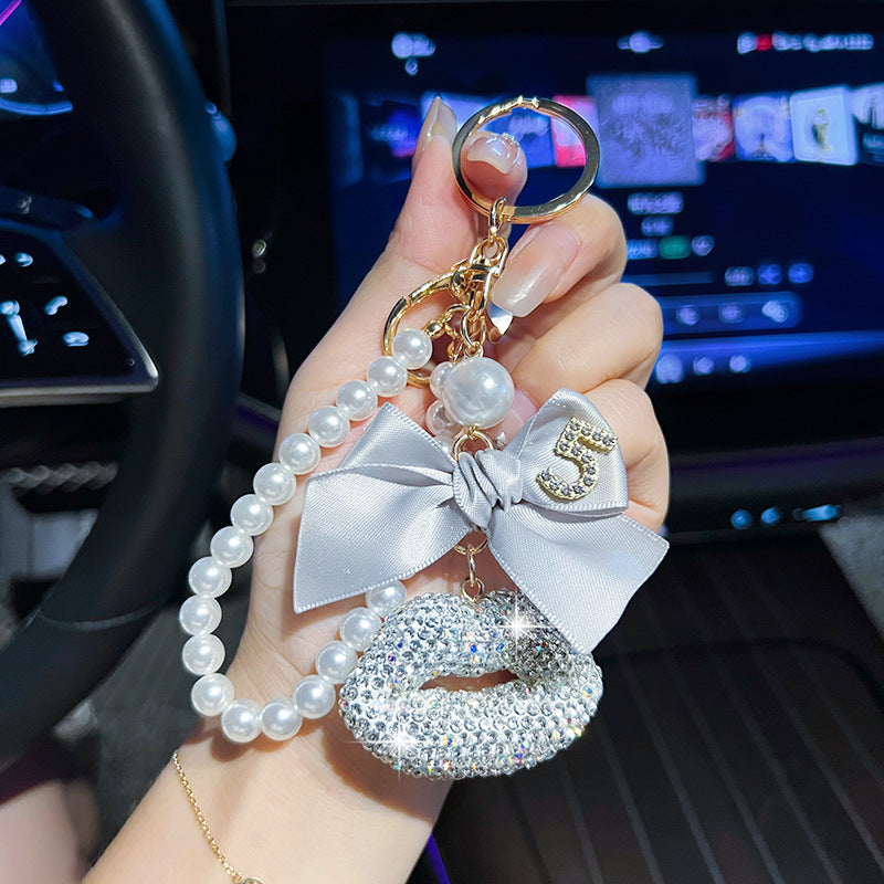 Wholesale New clay lips pearl chain car keychain